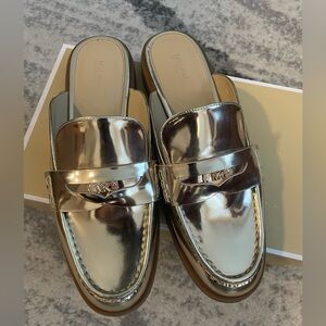 Gold Michael Kors women’s Mule.